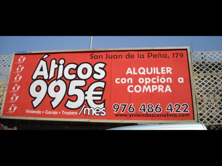 a sign that says alco's 955e in spanish