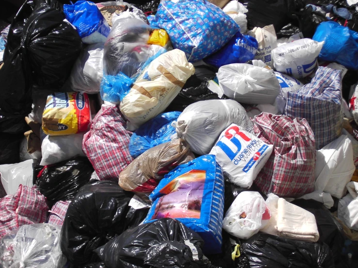 the pile of trash is full of various types and sizes