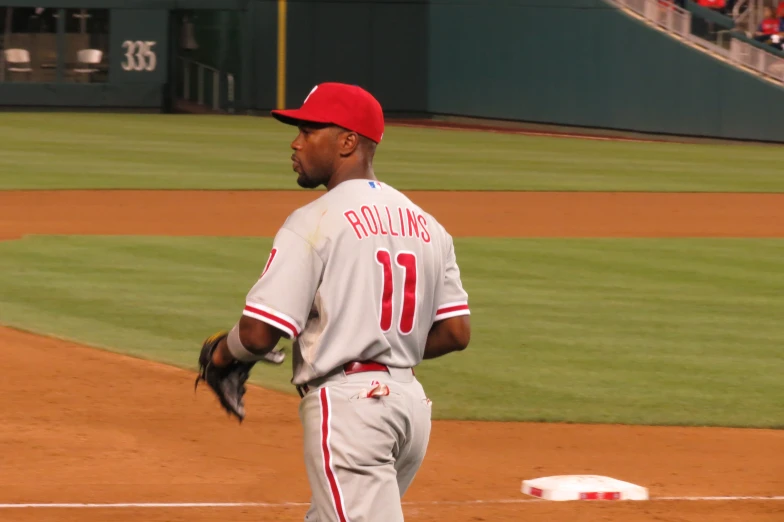 a professional baseball player walking onto a field