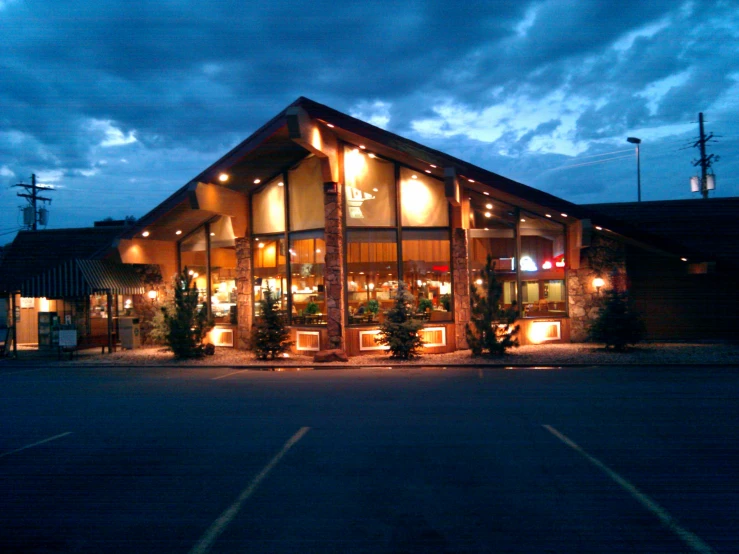 a large building with the lights turned on at night