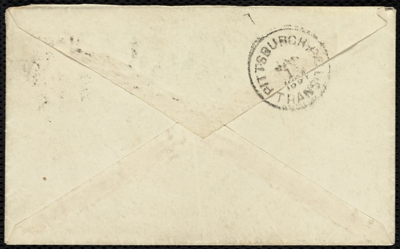 an old envelope with stamps on it