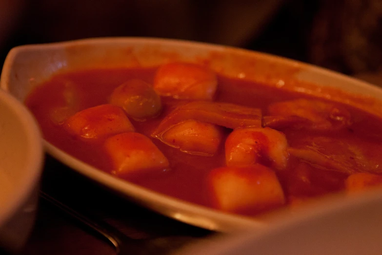 a bowl of food sits on a table