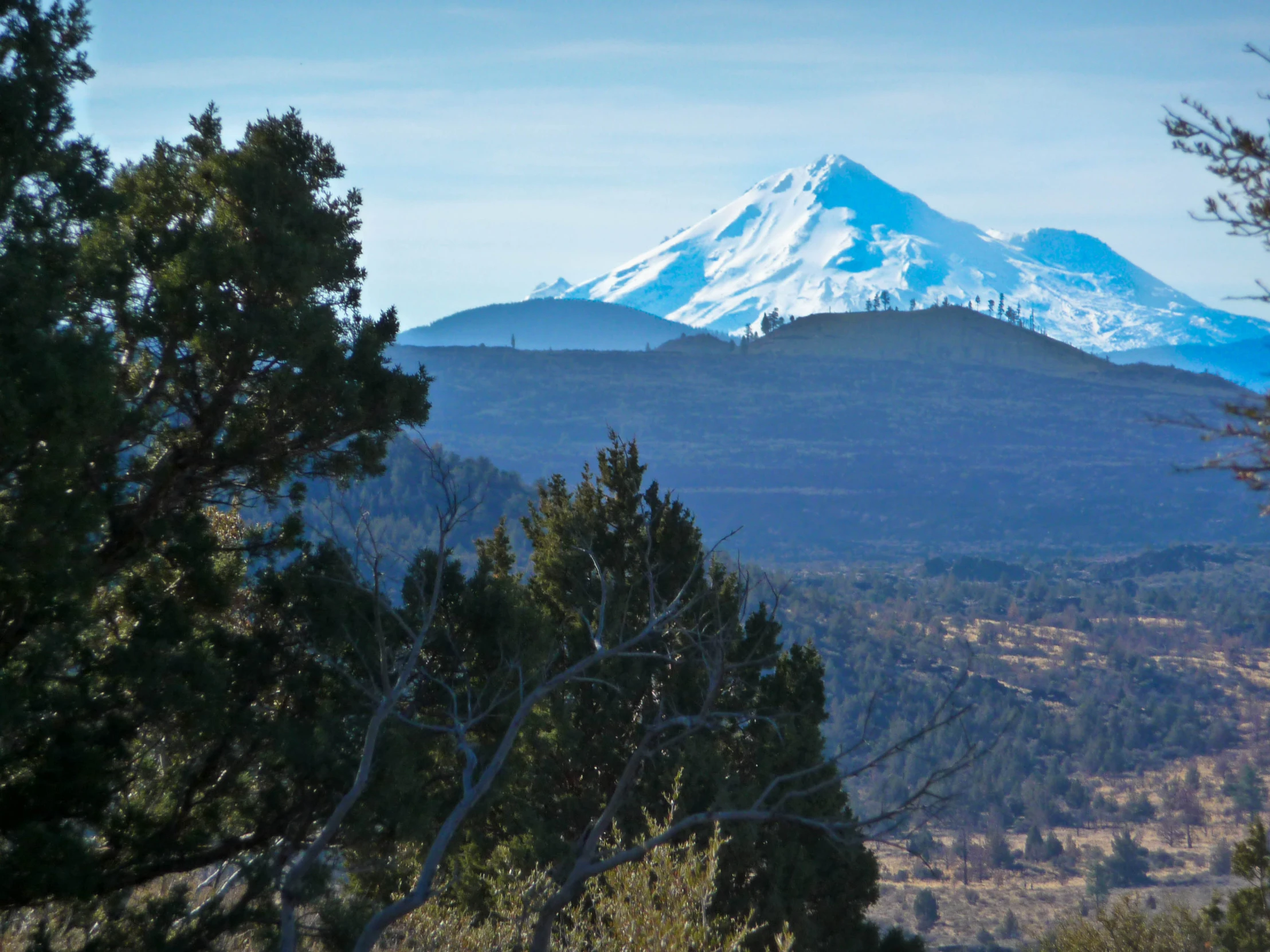 there is a large snow covered mountain in the distance