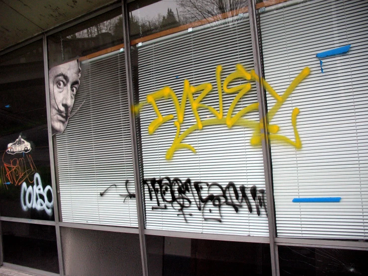 a window is shown with some graffiti on it