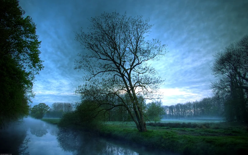 the sky is blue in the morning with clouds