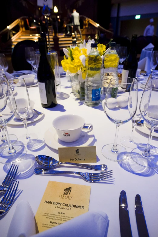 table with place settings and plates for a meal