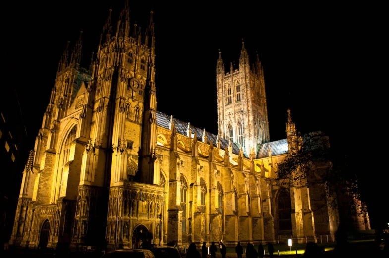 a large gothic style building with a clock tower