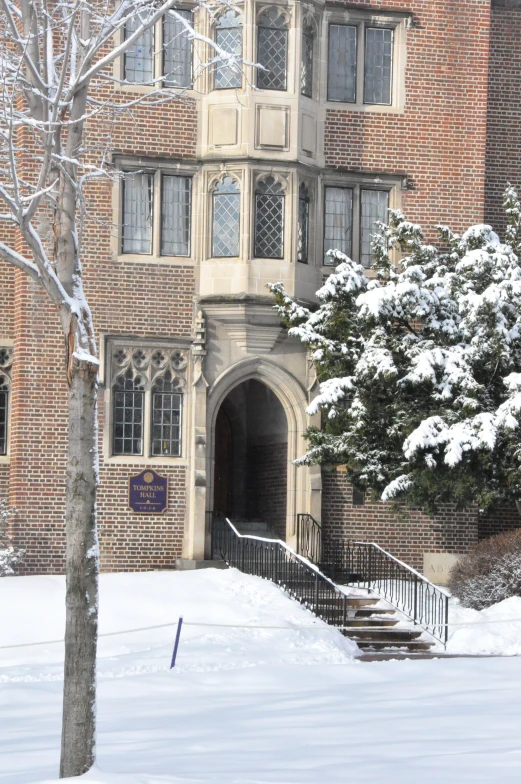 a building with lots of windows in the snow