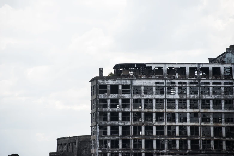 a tall building that has some very dirty windows