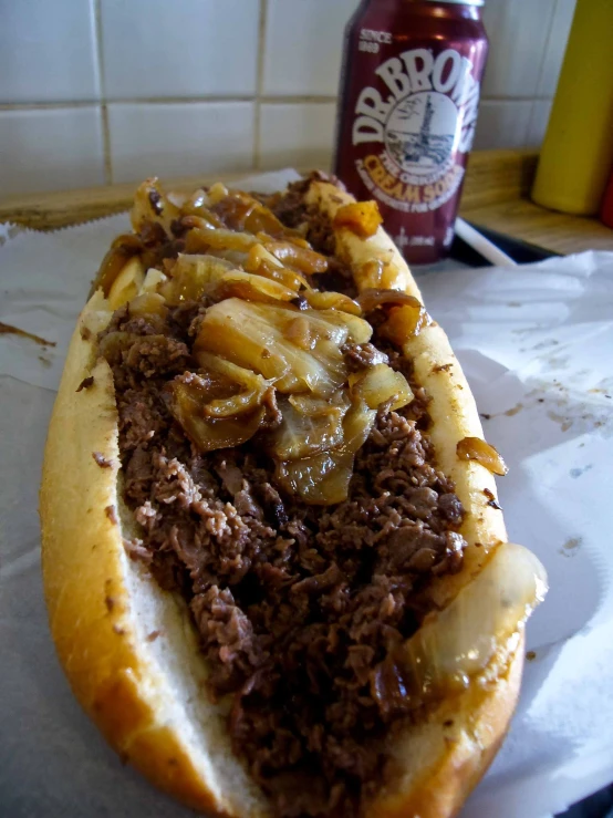 an extremely long chili cheese  dog