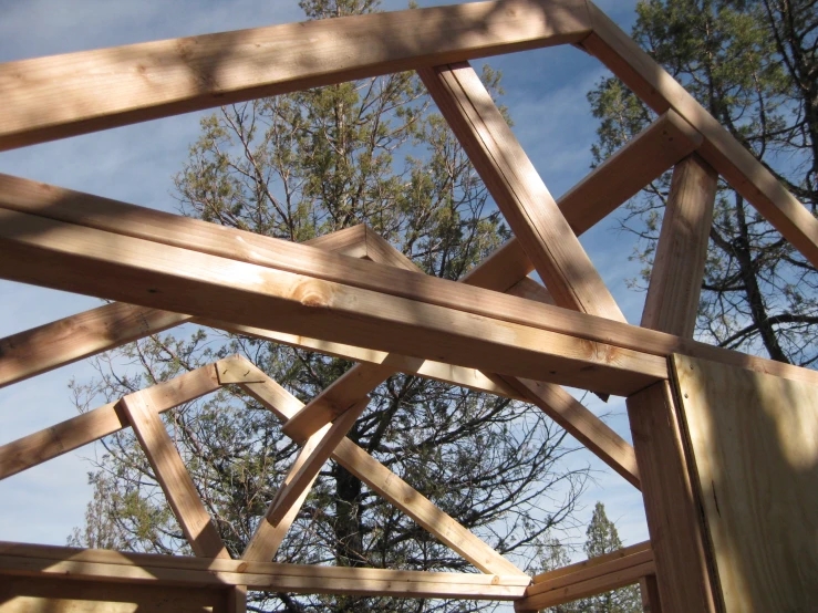 a po taken looking up at wooden framing