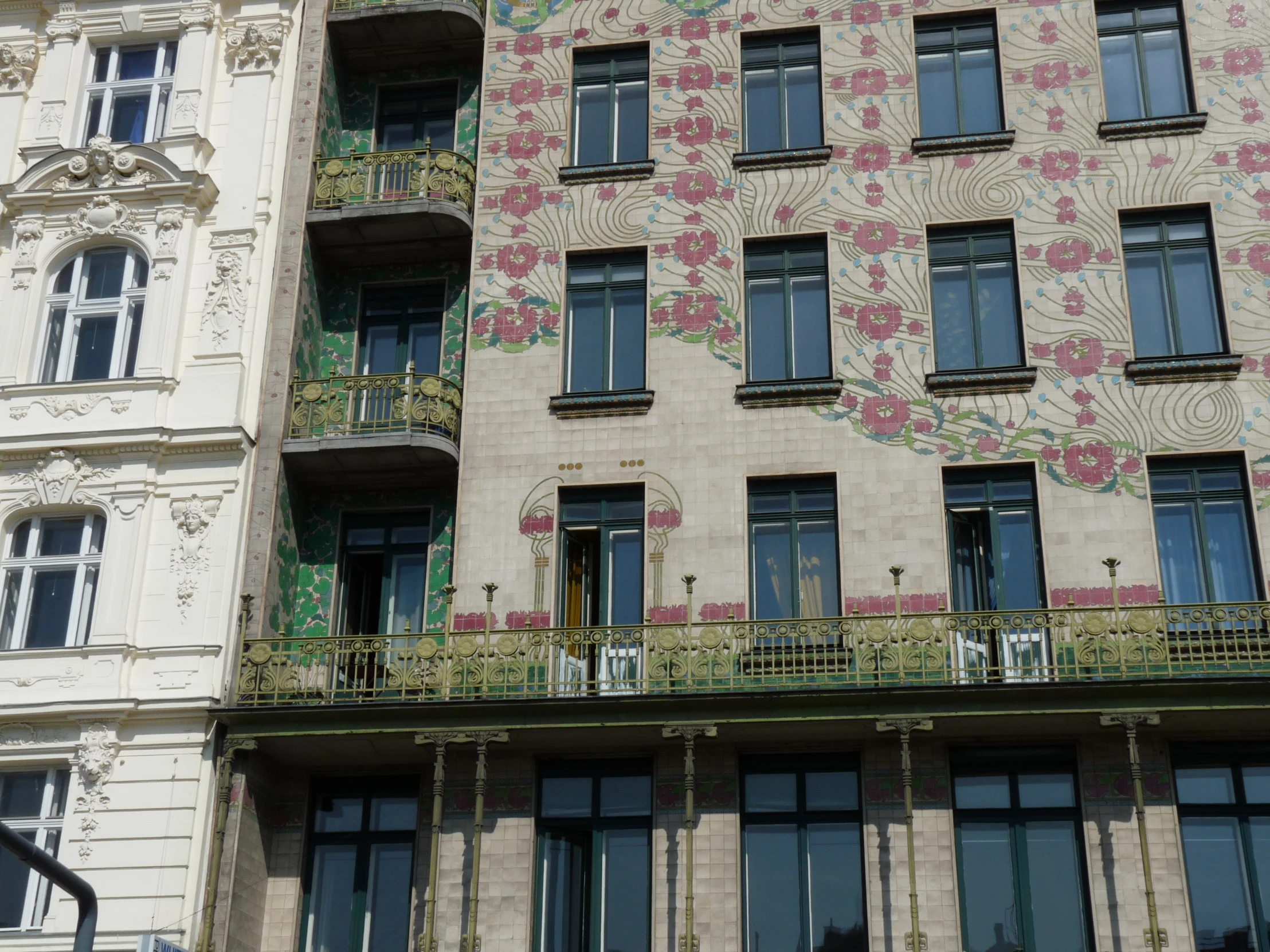 a city building that has a large colorful wall paper