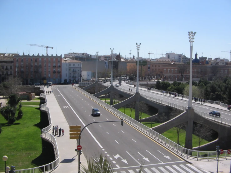 a street that is in front of a big building