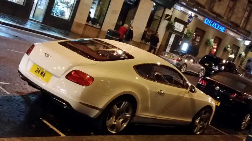 a car that is parked in front of a building