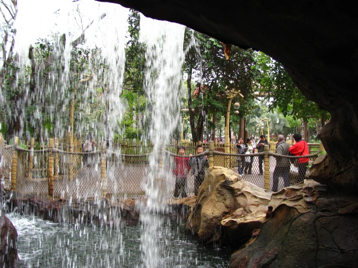 people looking at the water from an outside water feature