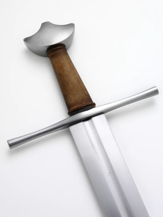 a sword with a wooden handle and blade that matches it