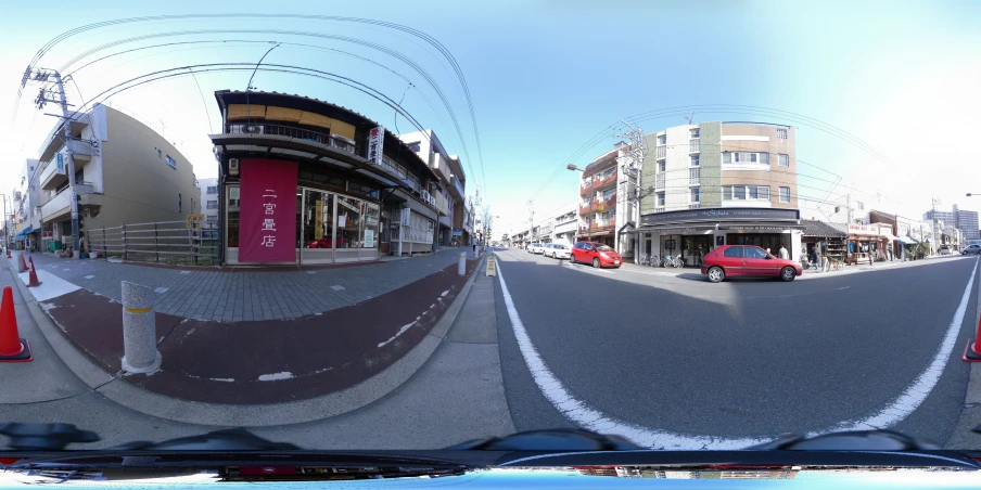 a street view taken from the front window of a car