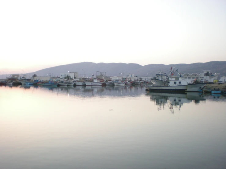 a number of boats docked at a harbor