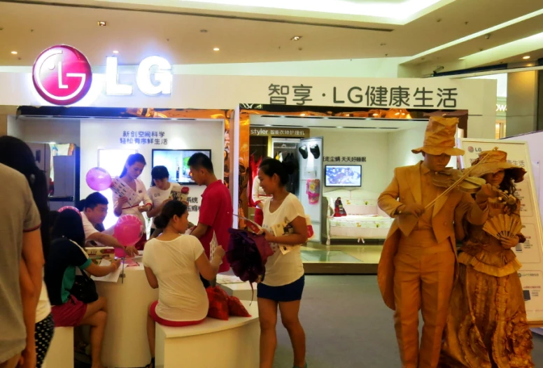 many people in costume standing around inside a mall