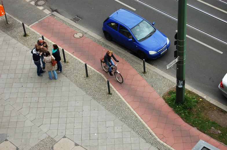 a man on his bike on the street