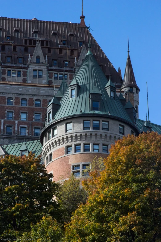 a very large castle like building with a roof top