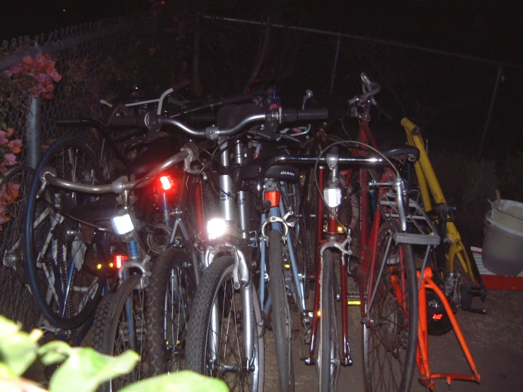 many bicycles are lined up next to each other