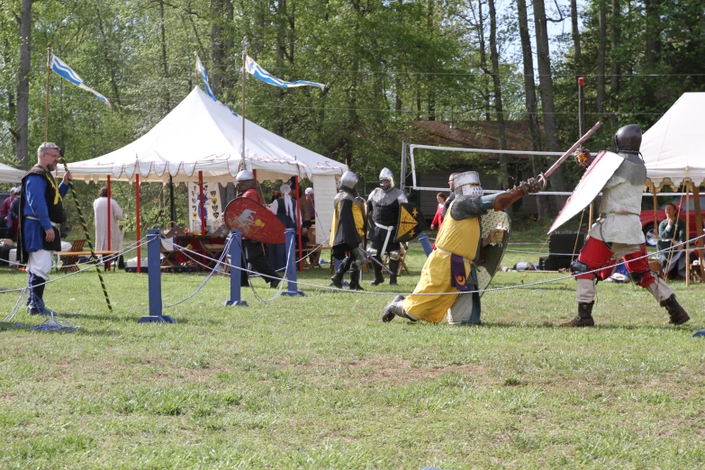 a man on a horse is fighting another man