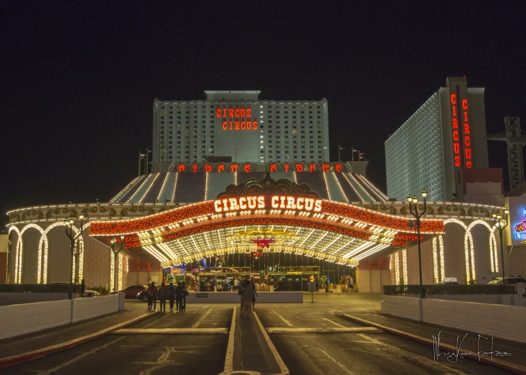 a very big pretty arch that has lights on it