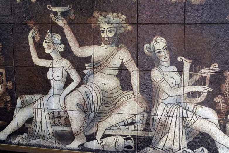 a mosaic of some ladies with food on the table