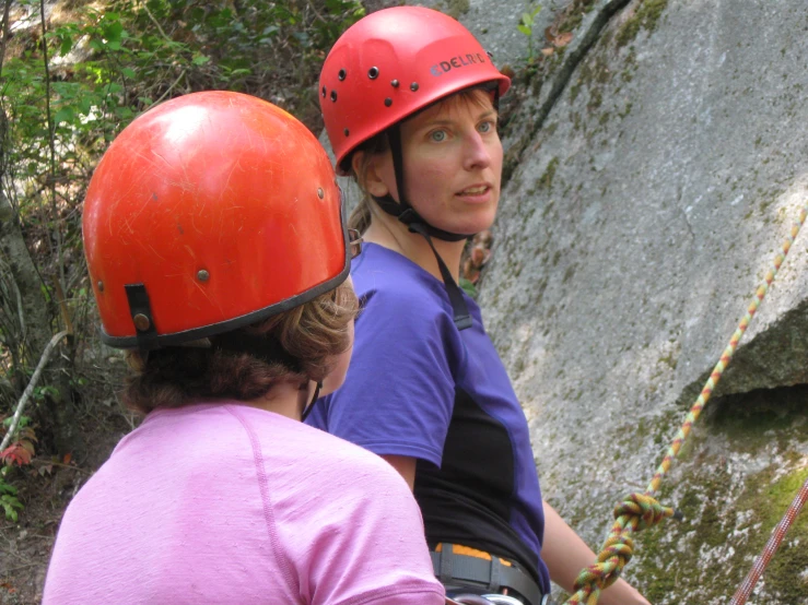 a man and a woman wearing safety gear