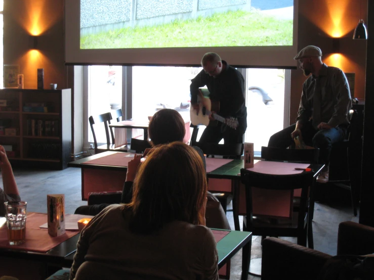 people at a restaurant who are sitting down