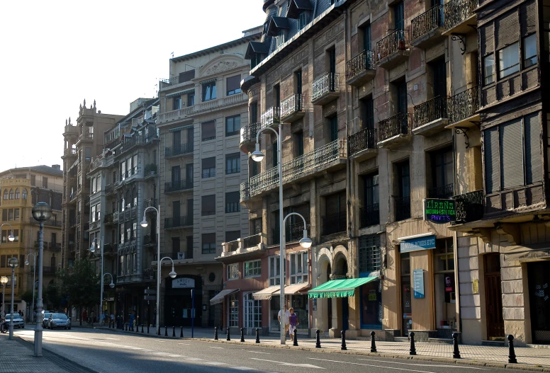 a city street with a couple of tall buildings