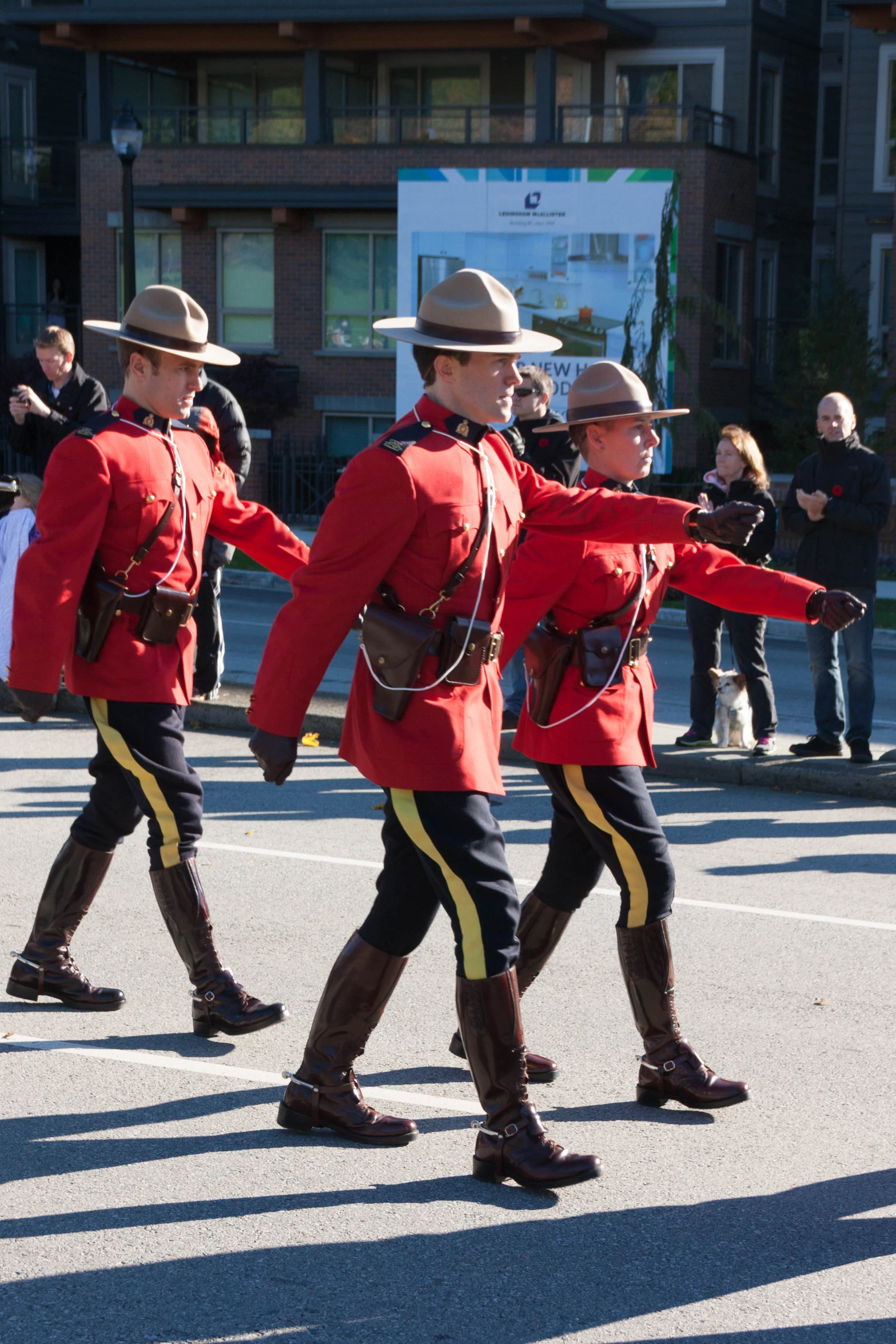 the band is running in formation with their instruments