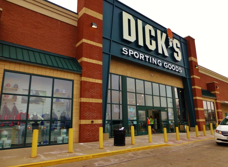 the front of a sports store with store fronts