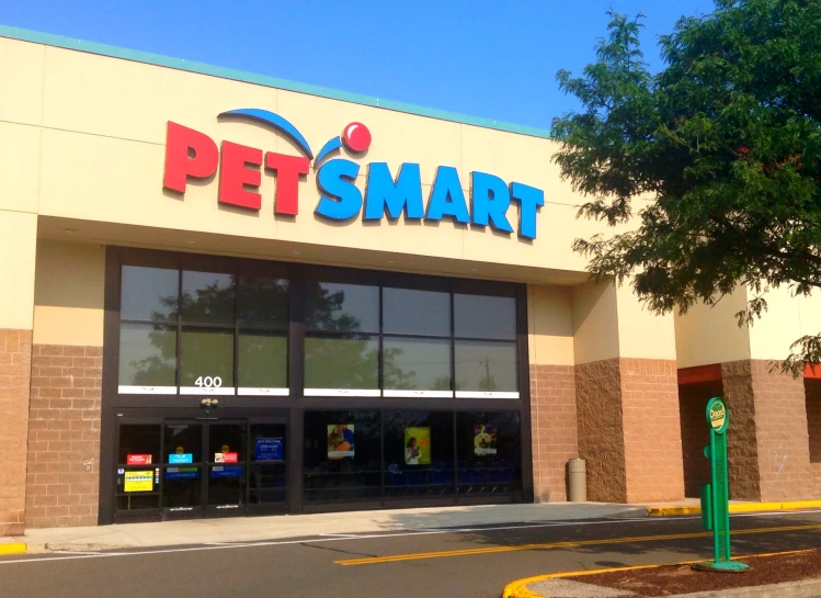 a store front with a large window that says pet smart