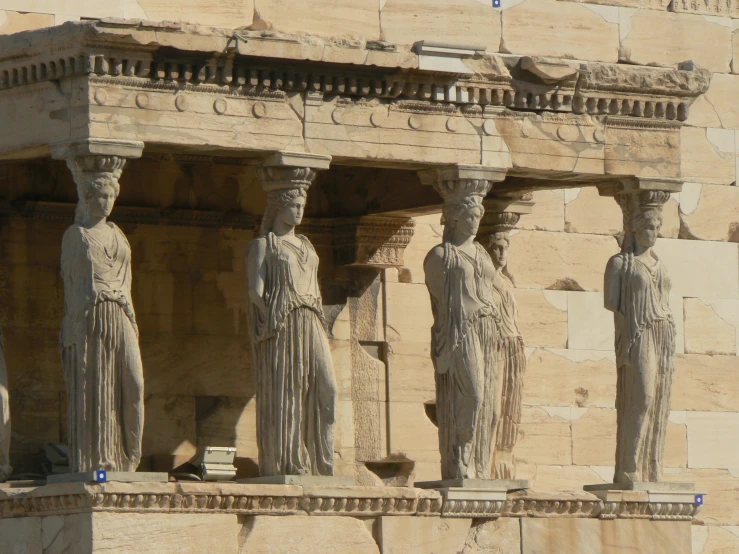 stone columns at the side of an ancient building