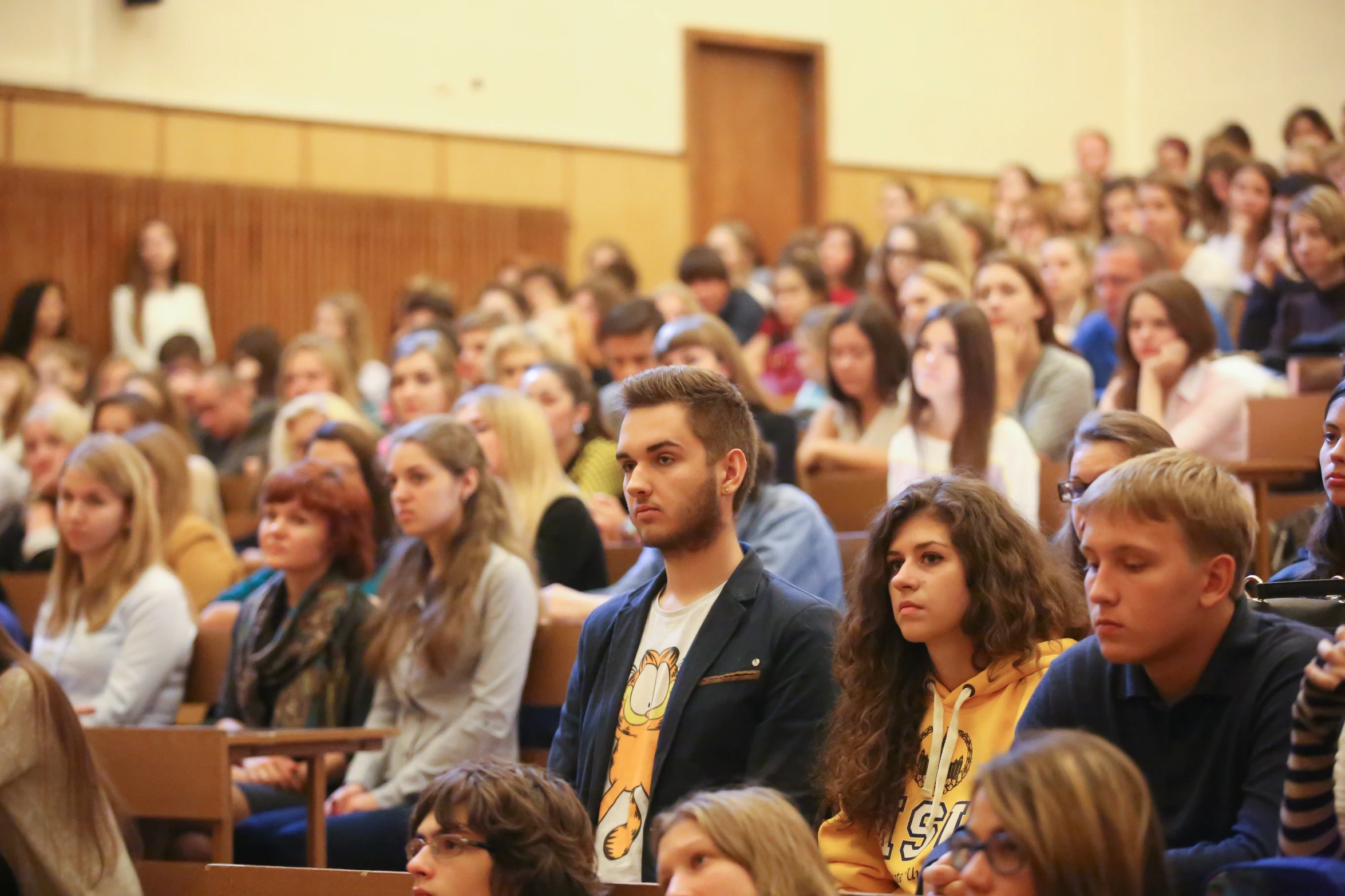 people at a seminar and on the phones