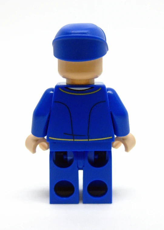 a small lego figure with blue outfit and hat