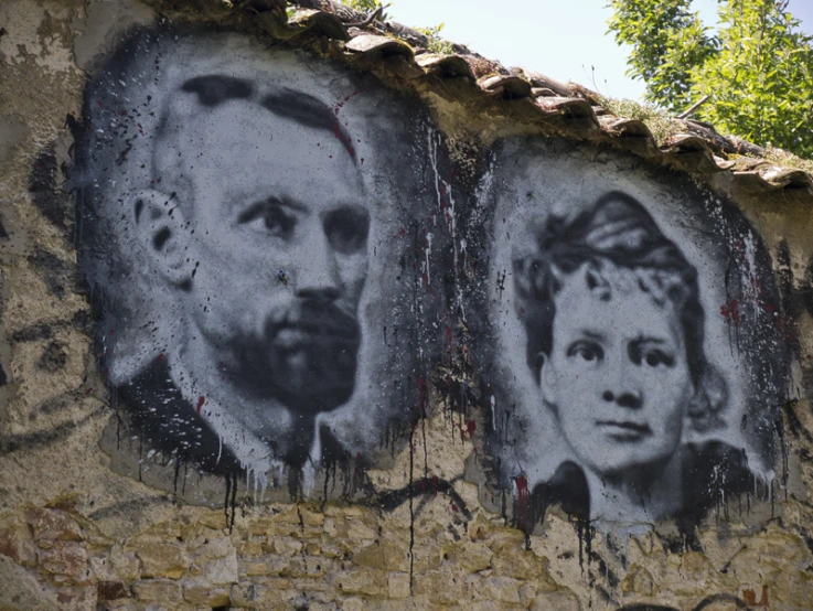 two paintings of men and women on a wall