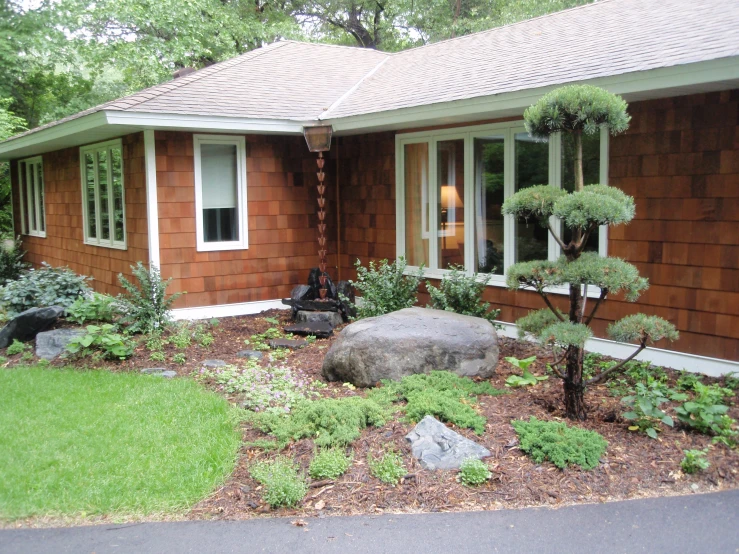 a small rock is displayed near the yard