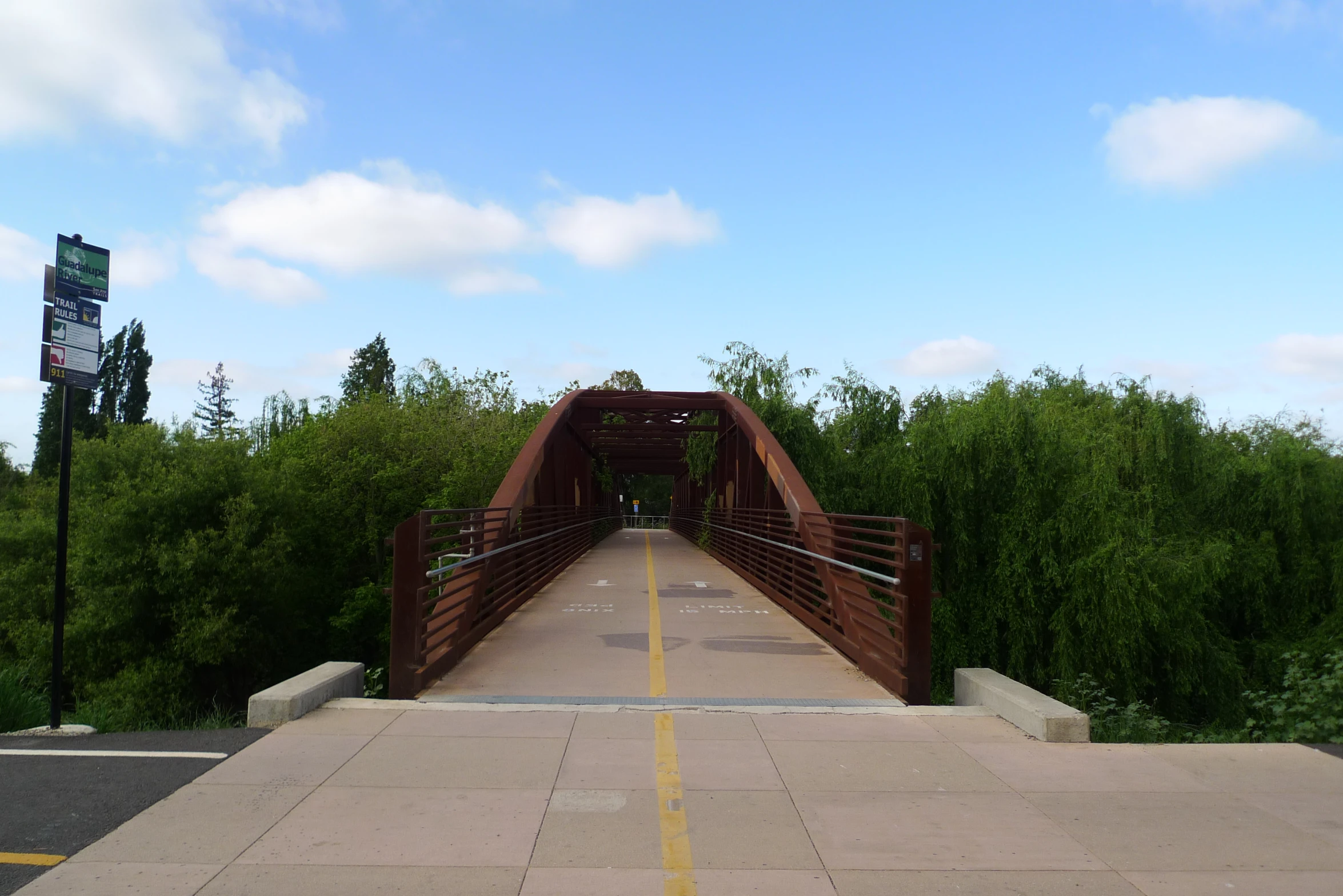 this is a picture of a bridge and trees