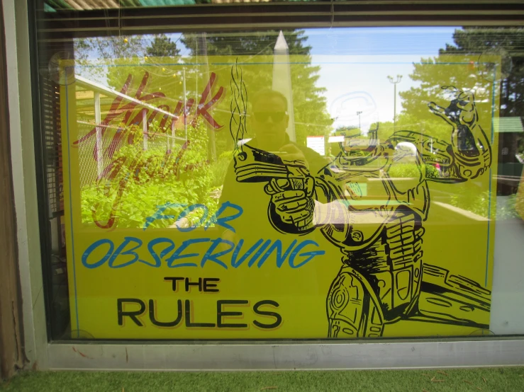 there is a sign on the window saying stop observing the rules