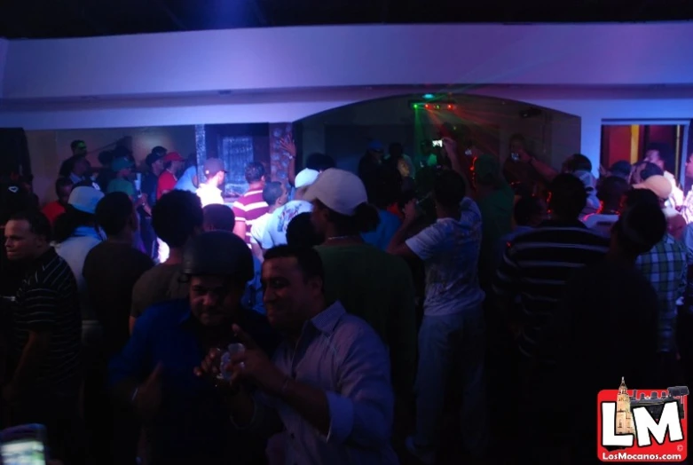 a group of people at a party in a building