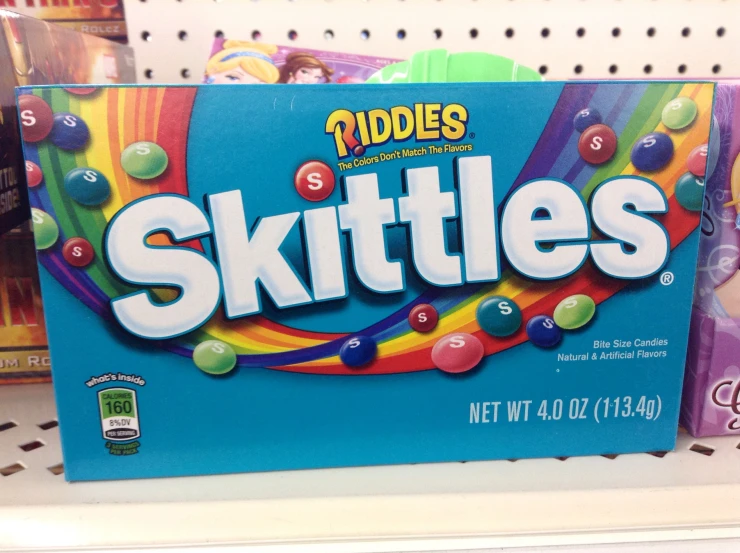 skittles candy on the shelves in a store