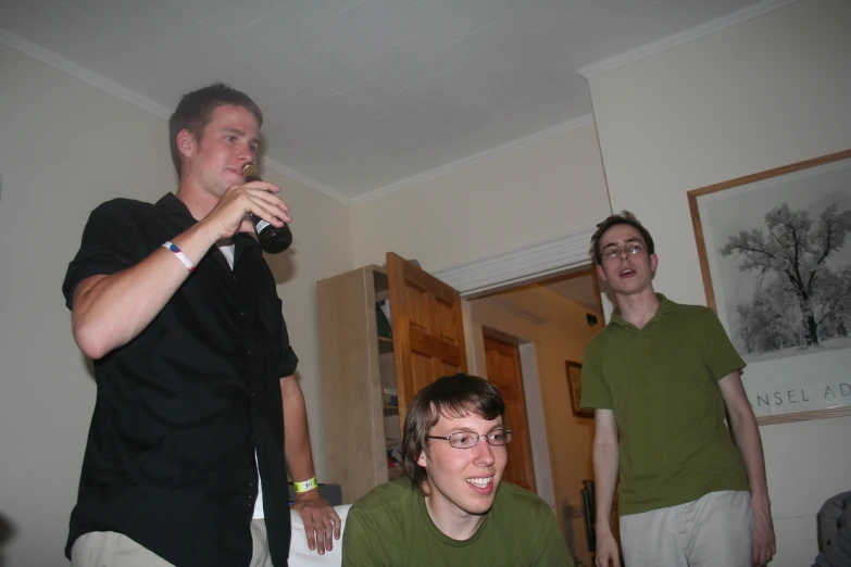 the two guys are playing a game on the wii