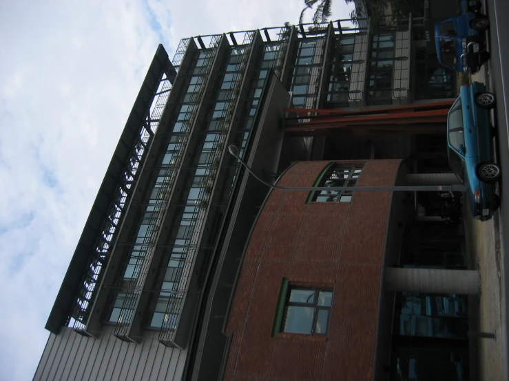 a building with cars parked in front of it