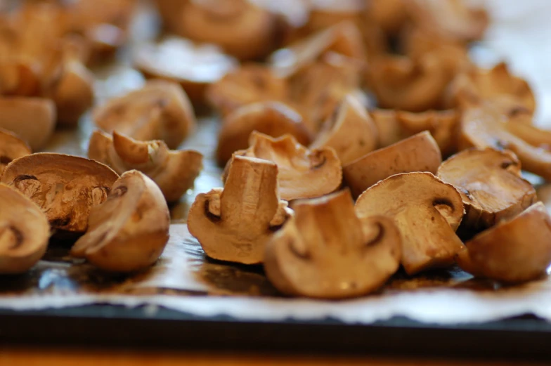 a bunch of mushrooms laying on the counter top