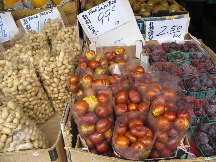 the boxes hold different varieties of fruits and vegetables