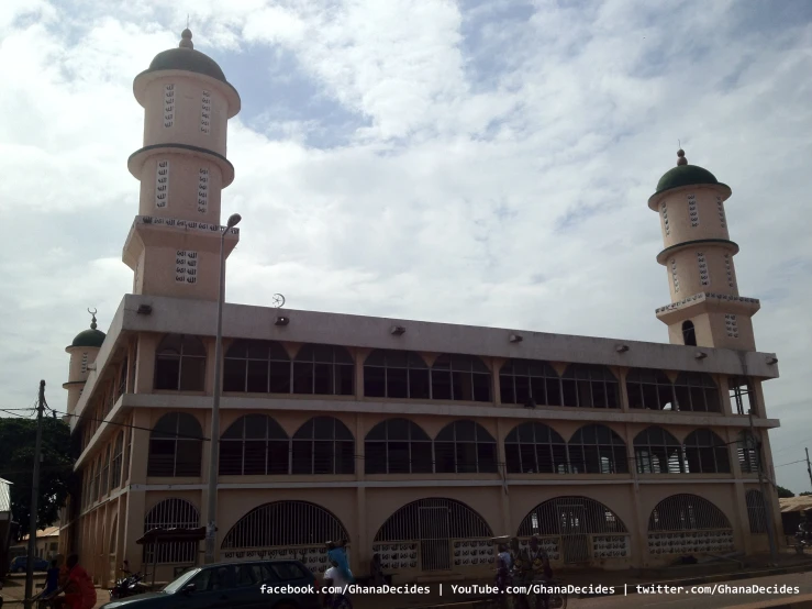 two large towers with one on the top of each building