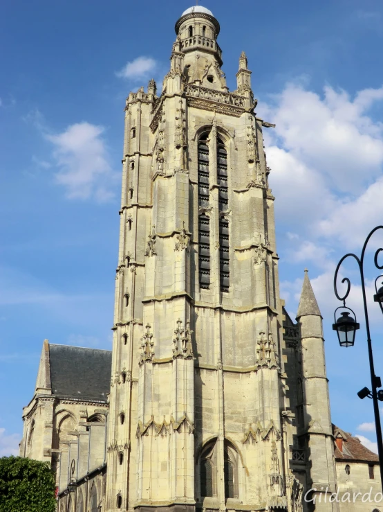 a tall cathedral with a clock on top